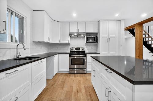 Cuisine - 4 Rue Labonté, Sainte-Thérèse, QC - Indoor Photo Showing Kitchen With Upgraded Kitchen