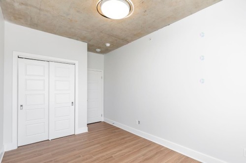 Chambre à coucher - 307-850 Rue Ouimet, Montréal (Saint-Laurent), QC - Indoor Photo Showing Other Room