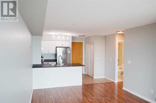 218 - 340 Watson Street W, Whitby (Port Whitby), ON - Indoor Photo Showing Kitchen With Double Sink