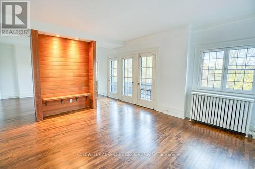 Living room with beautiful wood feature wall - #1 On 2Nd Floor - 8 1/2 Range Road, Ottawa, ON 