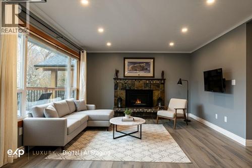Main living room with digital AI staging - 36 Mt Klauer Street, Fernie, BC - Indoor Photo Showing Living Room With Fireplace