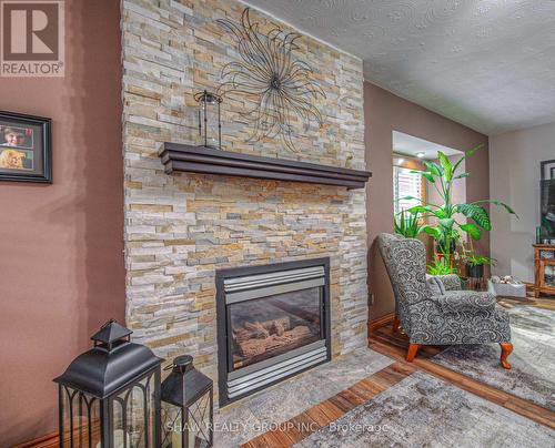 81 Beechwood Avenue, Hamilton, ON - Indoor Photo Showing Living Room With Fireplace