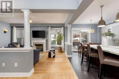 2299 Millstone Drive, Oakville, ON - Indoor Photo Showing Dining Room With Fireplace