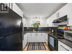 Fresh updates throughout, modern flooring and fixtures. - 