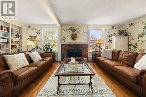 Wood burning fireplace - 141 & 142 Station Road, Prince Edward County (Hillier Ward), ON - Indoor Photo Showing Living Room With Fireplace