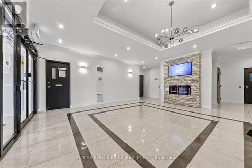 309 - 8 Silver Bell Grove, Toronto, ON - Indoor Photo Showing Other Room With Fireplace