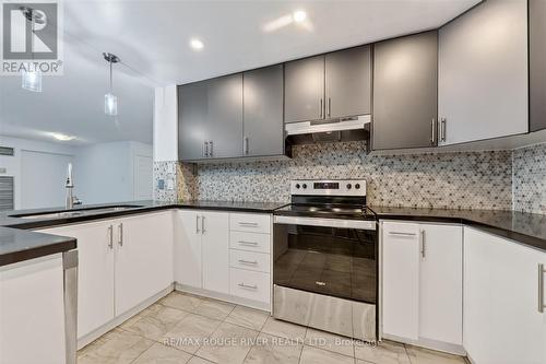 309 - 8 Silver Bell Grove, Toronto, ON - Indoor Photo Showing Kitchen With Upgraded Kitchen