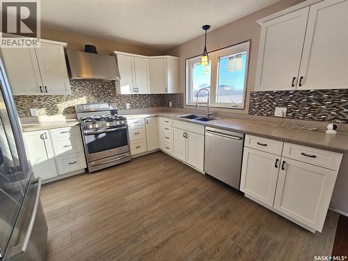 320 9Th Avenue E, Meadow Lake, SK - Indoor Photo Showing Kitchen With Double Sink