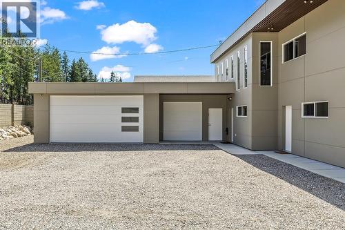Triple Heated and Cooled garage - 7141 Dunwaters Road, Kelowna, BC - Outdoor With Exterior