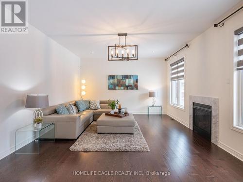 27 Scarlet Way, Bradford West Gwillimbury, ON - Indoor Photo Showing Living Room With Fireplace