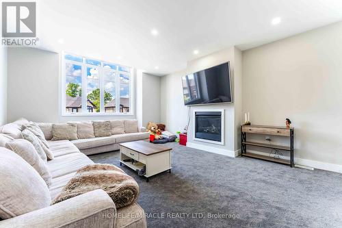 80 Doon Creek Street, Kitchener, ON - Indoor Photo Showing Living Room With Fireplace