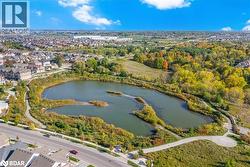 Aerial view of residential area with a large body of water - 
