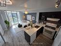 723 - 120 Dallimore Circle, Toronto, ON  - Indoor Photo Showing Kitchen 