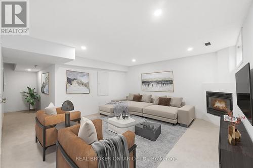 3 A Southpark Drive, Ottawa, ON - Indoor Photo Showing Living Room With Fireplace