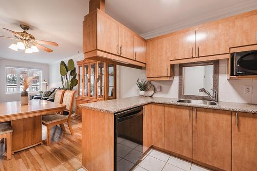 Cuisine - 101-2815 Boul. René-Laennec, Laval (Vimont), QC - Indoor Photo Showing Kitchen With Double Sink