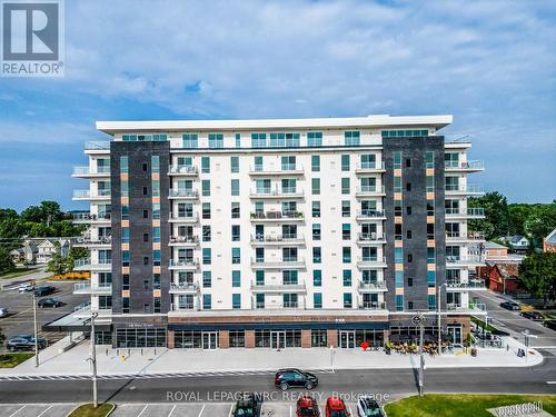 204 - 118 West Street, Port Colborne (Sugarloaf), ON - Outdoor With Balcony With Facade