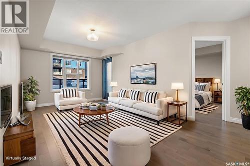 103 5303 Universal Crescent, Regina, SK - Indoor Photo Showing Living Room