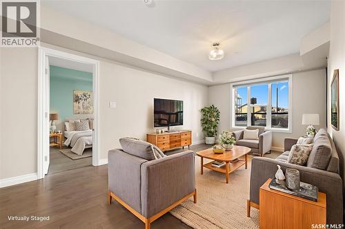 103 5303 Universal Crescent, Regina, SK - Indoor Photo Showing Living Room