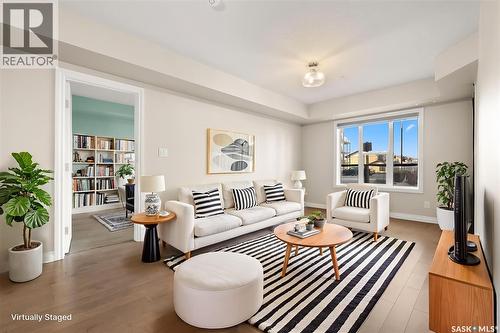 103 5303 Universal Crescent, Regina, SK - Indoor Photo Showing Living Room