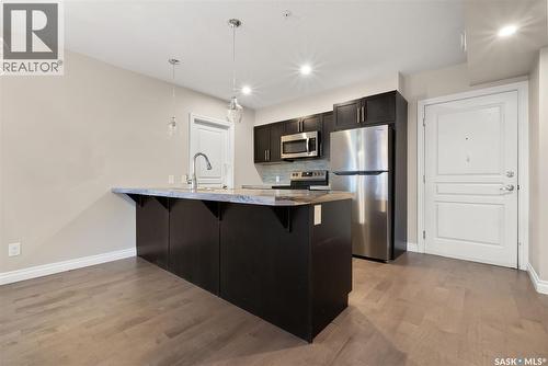 103 5303 Universal Crescent, Regina, SK - Indoor Photo Showing Kitchen