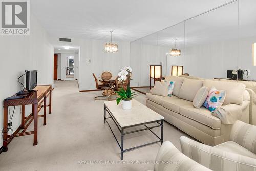 205 - 61 St Clair Avenue W, Toronto, ON - Indoor Photo Showing Living Room