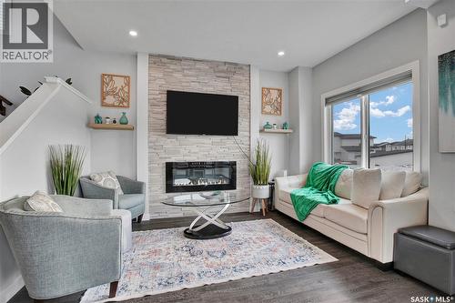 134 Germain Court, Saskatoon, SK - Indoor Photo Showing Living Room With Fireplace