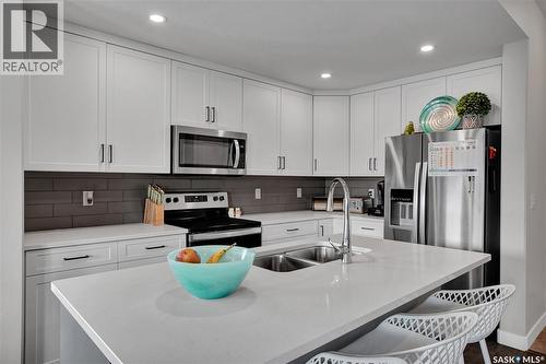 134 Germain Court, Saskatoon, SK - Indoor Photo Showing Kitchen With Stainless Steel Kitchen With Double Sink With Upgraded Kitchen