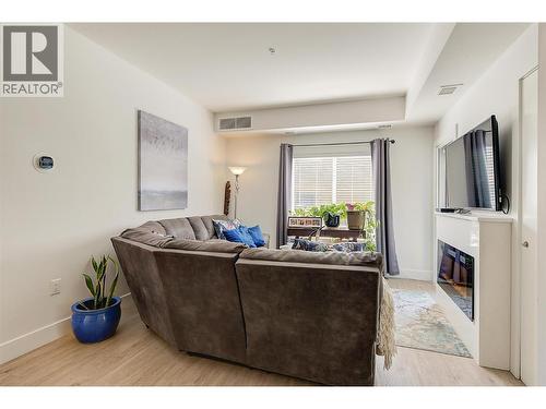 Living Room - 4380 Lakeshore Road Unit# 122, Kelowna, BC - Indoor Photo Showing Other Room With Fireplace