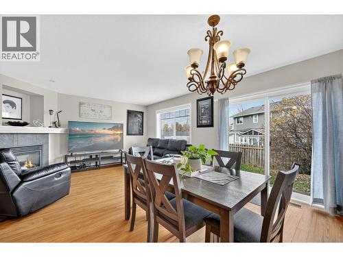180 Mccurdy Road Unit# 8, Kelowna, BC - Indoor Photo Showing Dining Room With Fireplace