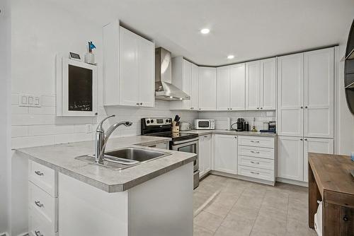 Cuisine - 104  - 106A Rue Notre-Dame, Saint-Jean-Sur-Richelieu, QC - Indoor Photo Showing Kitchen With Upgraded Kitchen
