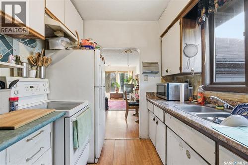 1109 7Th Street E, Saskatoon, SK - Indoor Photo Showing Kitchen With Double Sink
