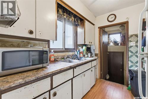 1109 7Th Street E, Saskatoon, SK - Indoor Photo Showing Kitchen With Double Sink