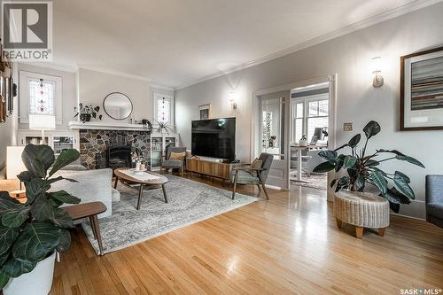 902 32Nd Street W, Saskatoon, SK - Indoor Photo Showing Living Room With Fireplace