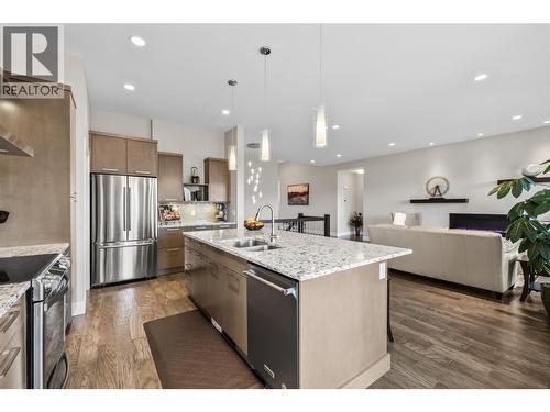 Kitchen - 1376 Mine Hill Drive, Kelowna, BC - Indoor Photo Showing Kitchen With Stainless Steel Kitchen With Double Sink With Upgraded Kitchen