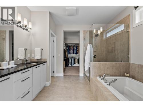 Large primary ensuite with walk - in closet. - 1376 Mine Hill Drive, Kelowna, BC - Indoor Photo Showing Bathroom