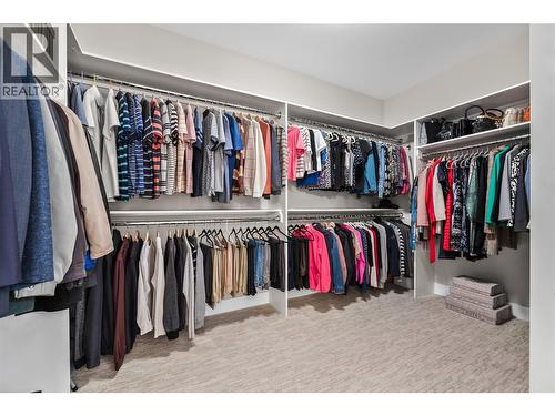 Walk-in closet with built in shelving. - 1376 Mine Hill Drive, Kelowna, BC - Indoor With Storage