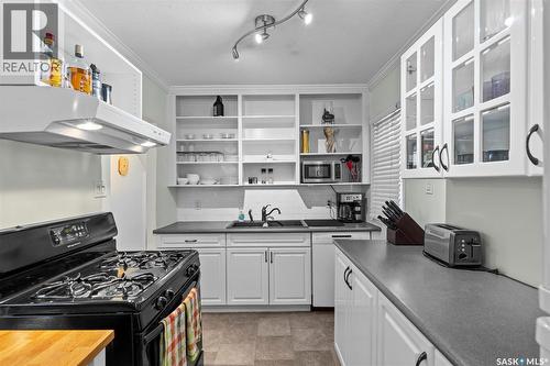 1406 10Th Avenue N, Saskatoon, SK - Indoor Photo Showing Kitchen With Double Sink