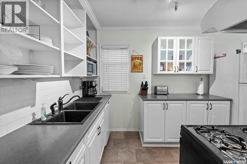1406 10Th Avenue N, Saskatoon, SK - Indoor Photo Showing Kitchen With Double Sink