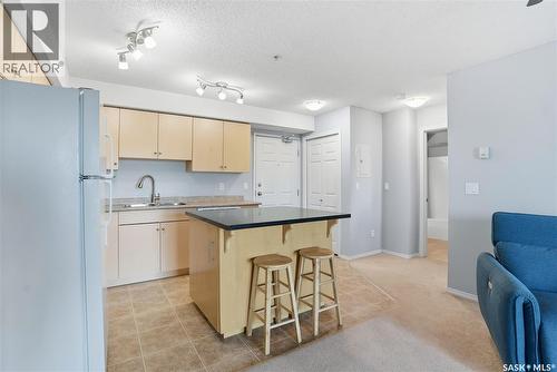 107 303 Lowe Road, Saskatoon, SK - Indoor Photo Showing Kitchen With Double Sink