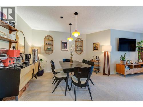 New Lighting throughout the whole home. - 983 Bernard Avenue Unit# 205, Kelowna, BC - Indoor Photo Showing Dining Room