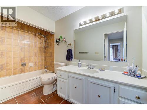 Second Bathroom, new tile flooring - 983 Bernard Avenue Unit# 205, Kelowna, BC - Indoor Photo Showing Bathroom