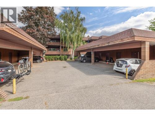 Covered Parking Stall with Large Storage Room behind it - 983 Bernard Avenue Unit# 205, Kelowna, BC - Outdoor