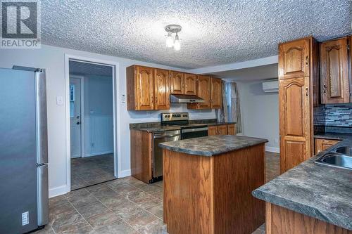 7 Bridge Road, Torbay, NL - Indoor Photo Showing Kitchen With Double Sink