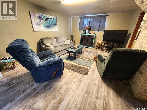 1272 King Street, Estevan, SK - Indoor Photo Showing Living Room With Fireplace