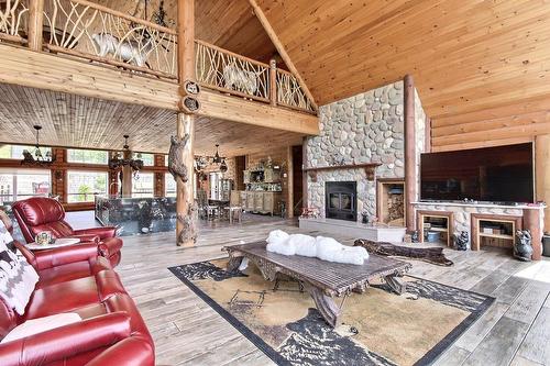 Living room - 40 Rue De L'Orée-Des-Bois, Sainte-Catherine-De-La-Jacques-Cartier, QC -  Photo Showing Other Room With Fireplace