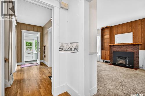 1120 3Rd Avenue Nw, Moose Jaw, SK - Indoor With Fireplace