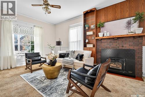 1120 3Rd Avenue Nw, Moose Jaw, SK - Indoor Photo Showing Living Room With Fireplace