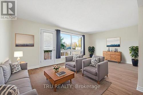 Living Room - Virtually Staged - 302 - 2290 Cotters Crescent, Ottawa, ON - Indoor Photo Showing Living Room