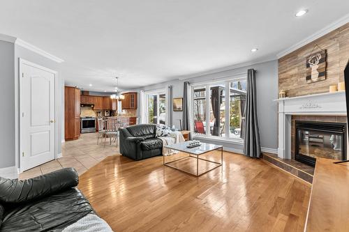 Family room - 57 Rue De La Valline, Notre-Dame-De-L'Île-Perrot, QC - Indoor Photo Showing Living Room With Fireplace