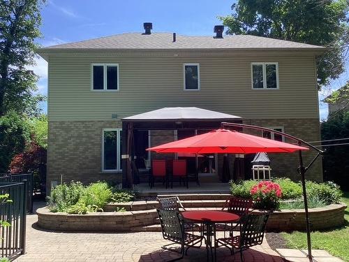 Backyard - 57 Rue De La Valline, Notre-Dame-De-L'Île-Perrot, QC - Outdoor With Deck Patio Veranda With Exterior